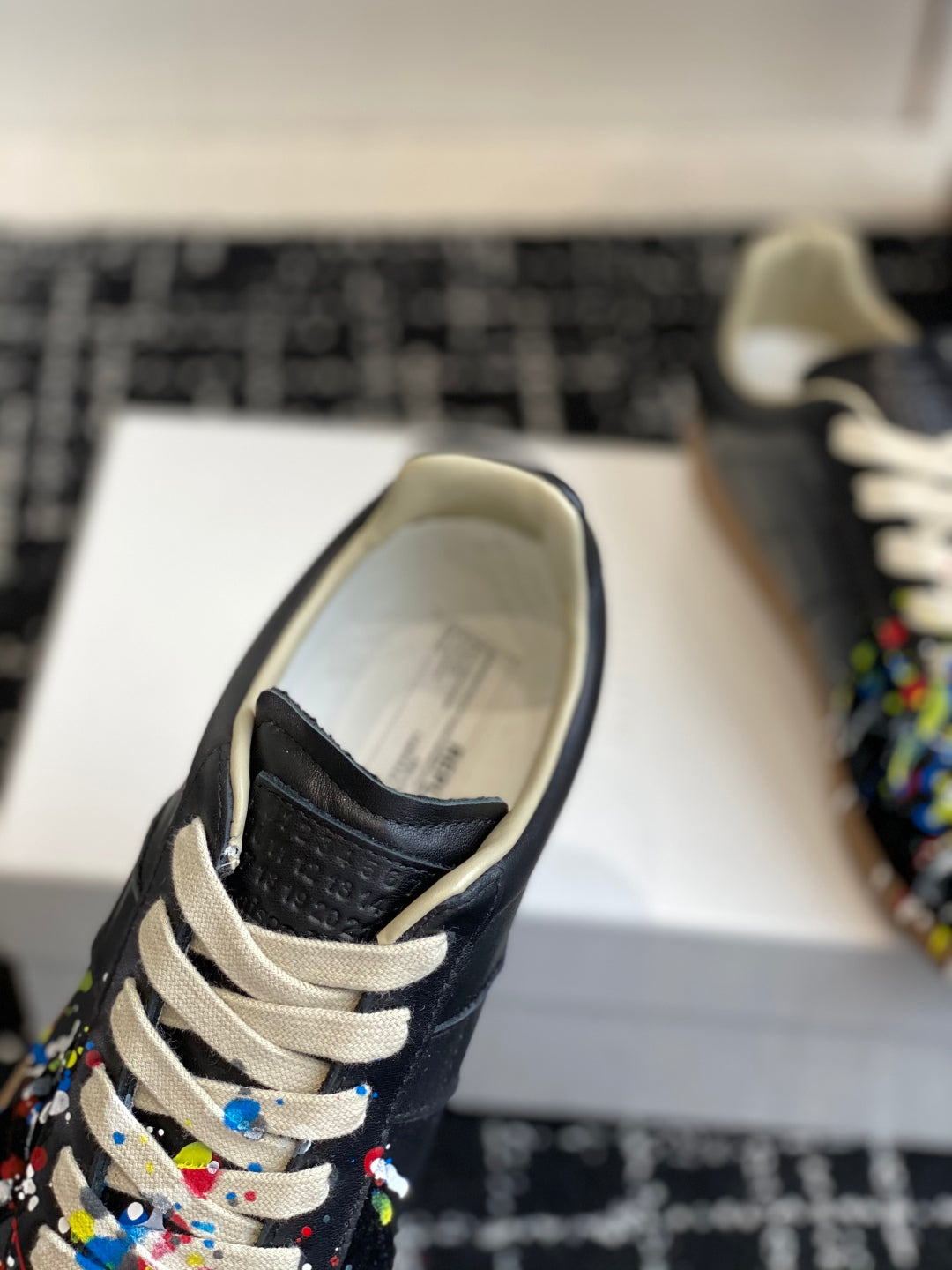 Maison Margiela
Replica Paint low-top Sneakers, Black/multicolour