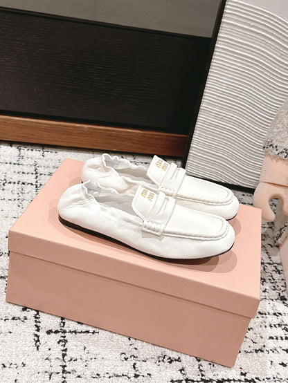 Miu Miu Embossed-logo Loafers, White