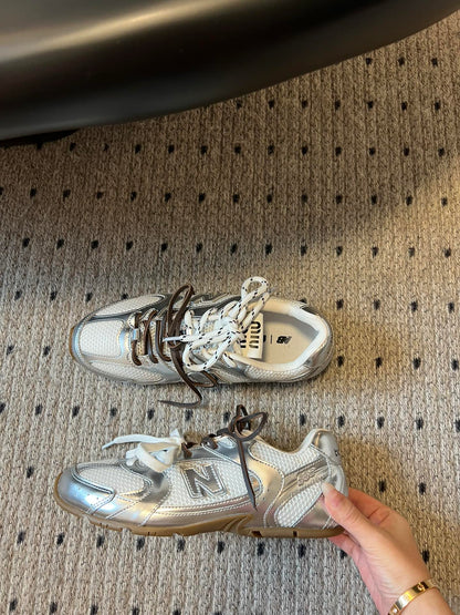 New Balance X Miu Miu 530 SL metallic leather and mesh Sneakers, Silver